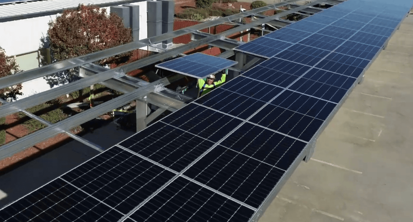 NextSpan crew installing a commercial solar carport